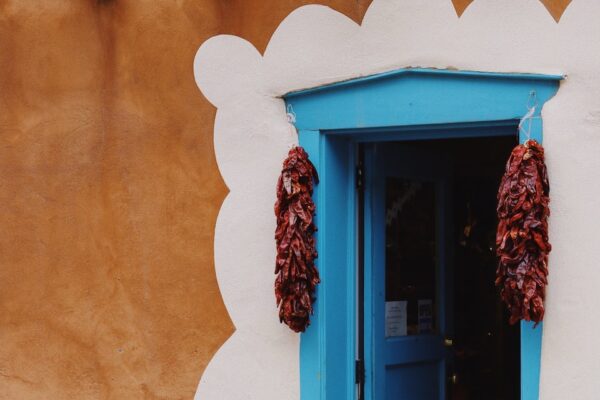 blue wooden door with red door frame